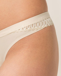 Majtki stringi Aura Spotlight High Leg string Triumph 10207998 - beżowe